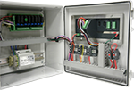 Control panel with various components inside a metallic cabinet